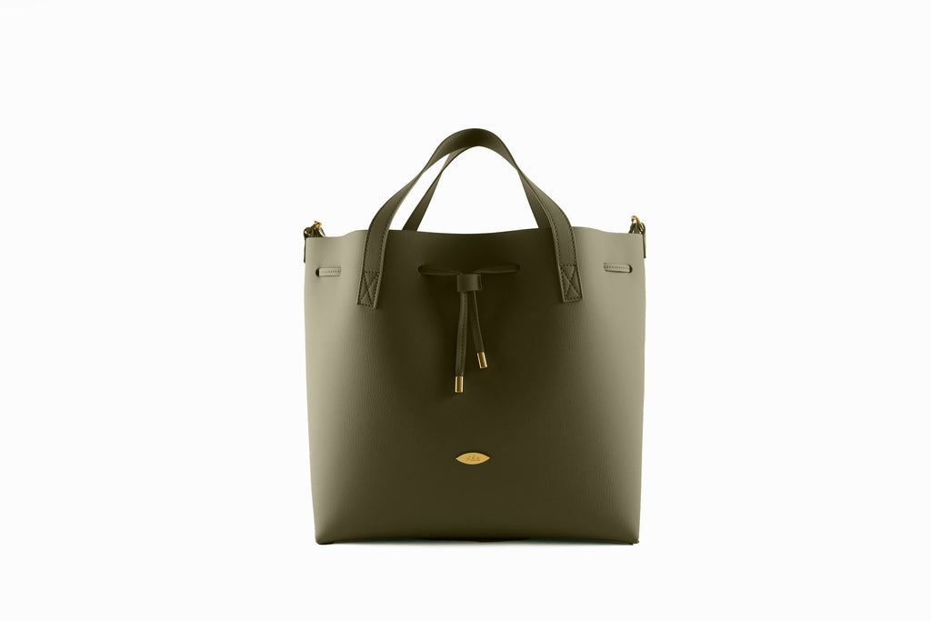 Green handbag with drawstring on a white background