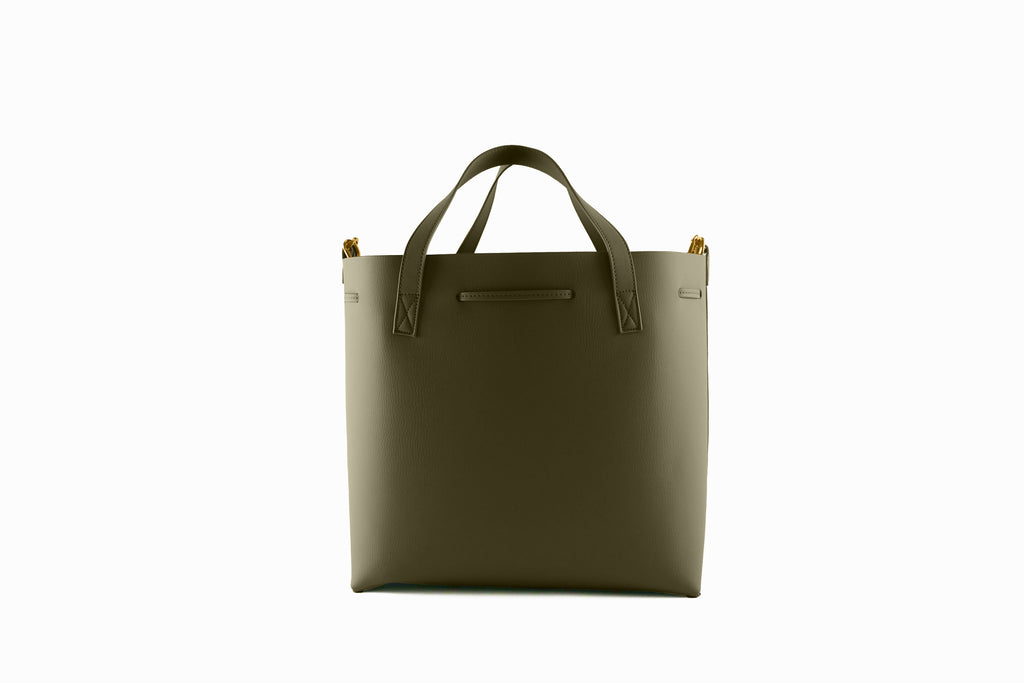 Back of green tote bag on a white background